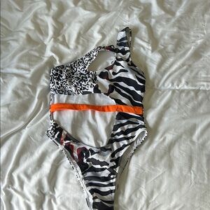 Stylish Zebra Print One-Piece Swimsuit with Orange Accent